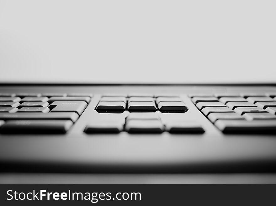 Horizontal Black And White Keyboard Keys Bokeh Background