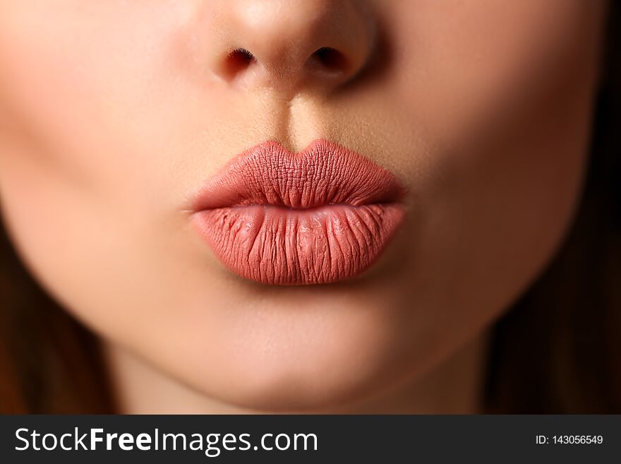 Beautiful Female Lips Making Kiss Gesture Flirting To Camera