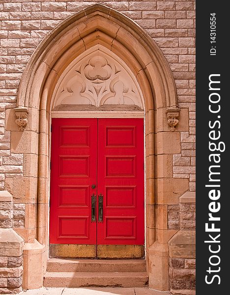 Image of red door on the front of a church. Image of red door on the front of a church
