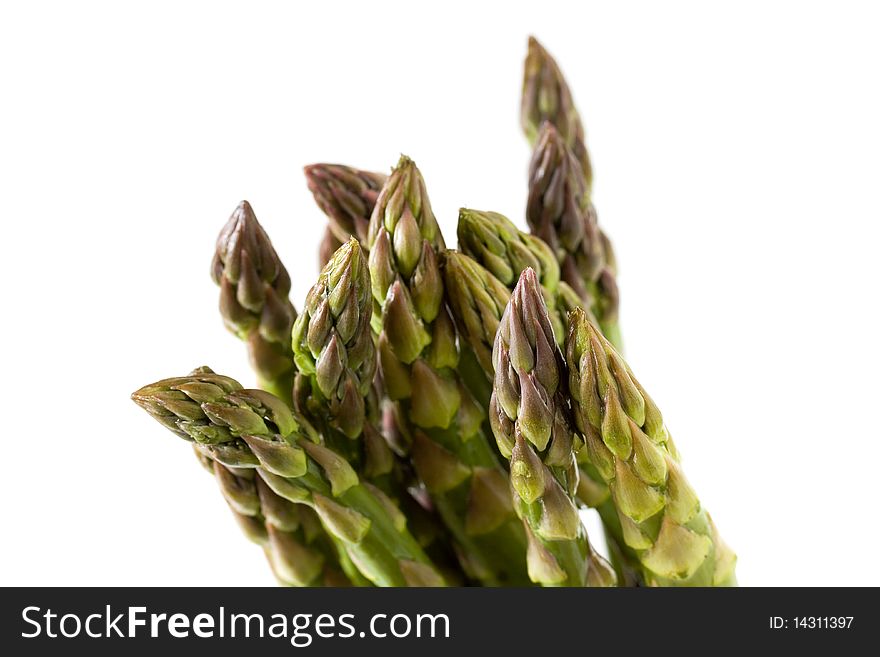 A bundle of fresh ,ripe green asparagus on white.