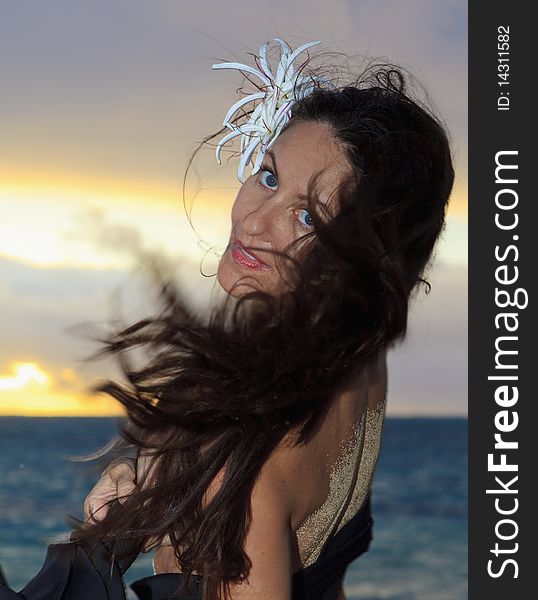 Portrait of forty year old woman at sunrise in hawaii