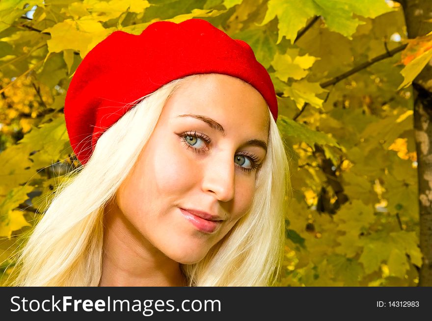 Blonde Girl In Red Cap