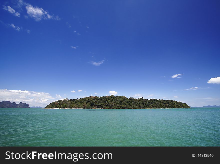 The beautiful island with the blue sky and turquoise sea