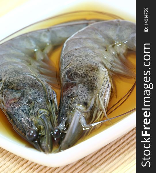 Famous chinese live prawns served in hard liquor. Famous chinese live prawns served in hard liquor.