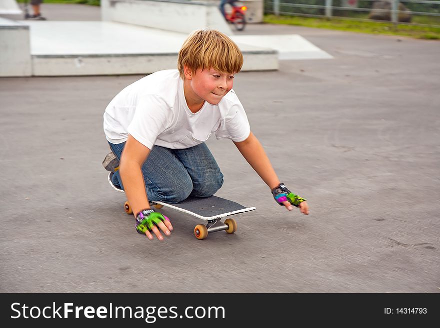 Boy riding skate board