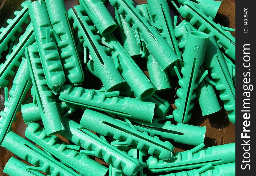 Detail photo texture of green dowels background