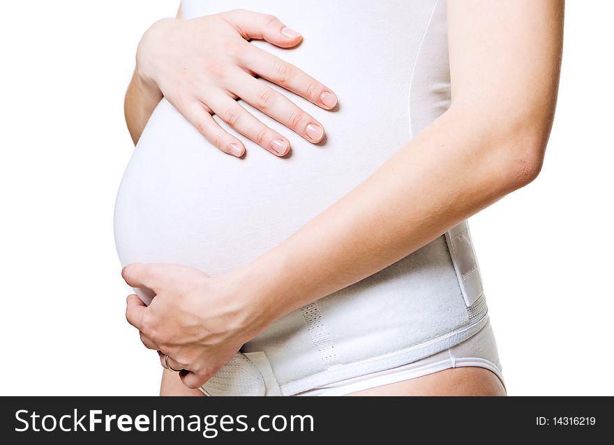 Closeup of a young pregnant woman with corset