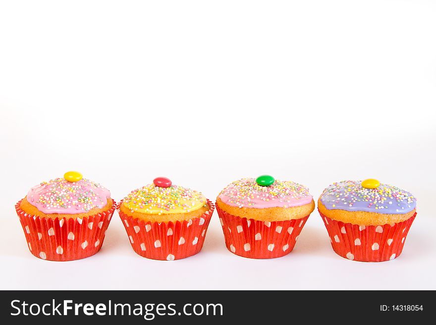 Cupcake muffins with red paper. Cupcake muffins with red paper