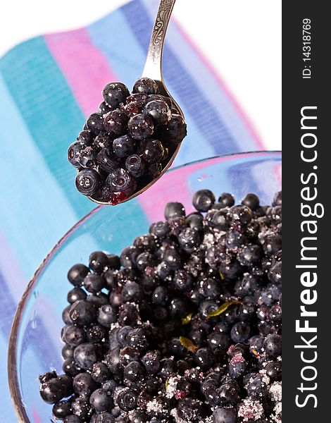 Food series: ripe bilberries in the glass bowl