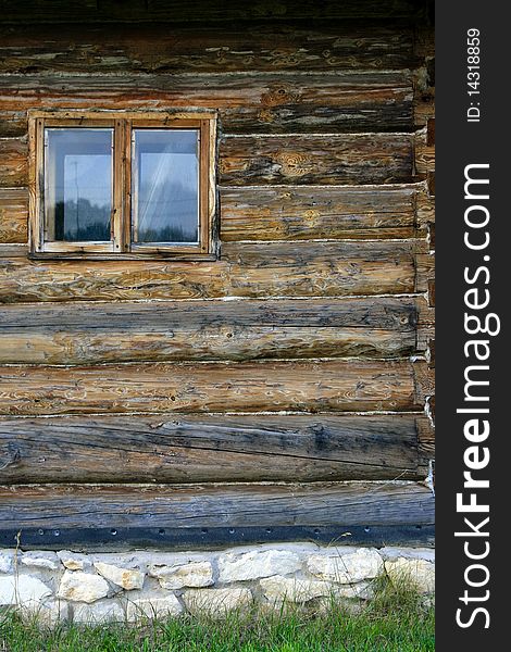 Wall Of Log House With Window