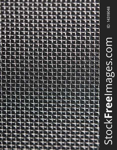 Professional audio speaker net close-up. Professional audio speaker net close-up.