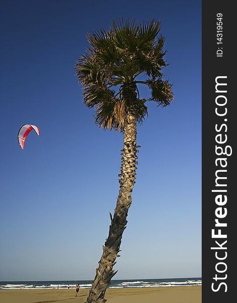 Kite surfing in the air, sea and beach in the Mediterranean