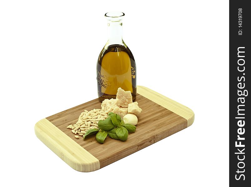 The ingredients for basil sauce on a white background. The ingredients for basil sauce on a white background