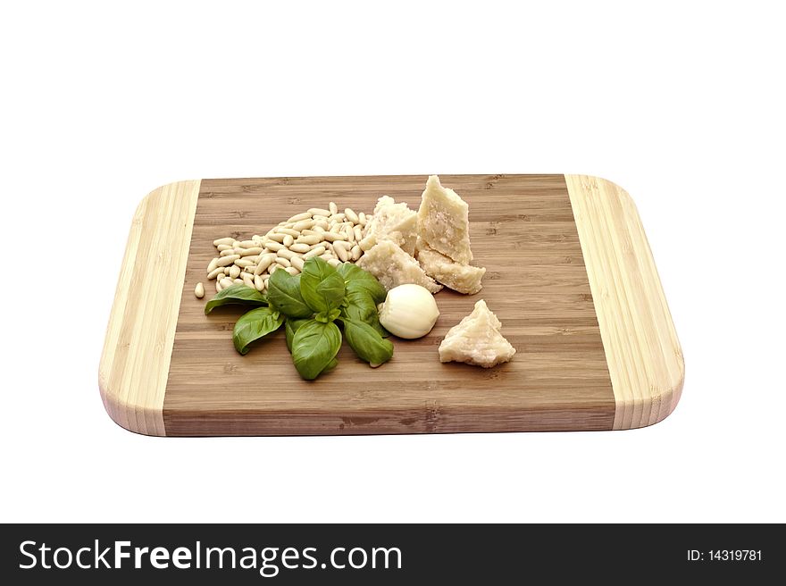 The ingredients for basil sauce on a white background. The ingredients for basil sauce on a white background