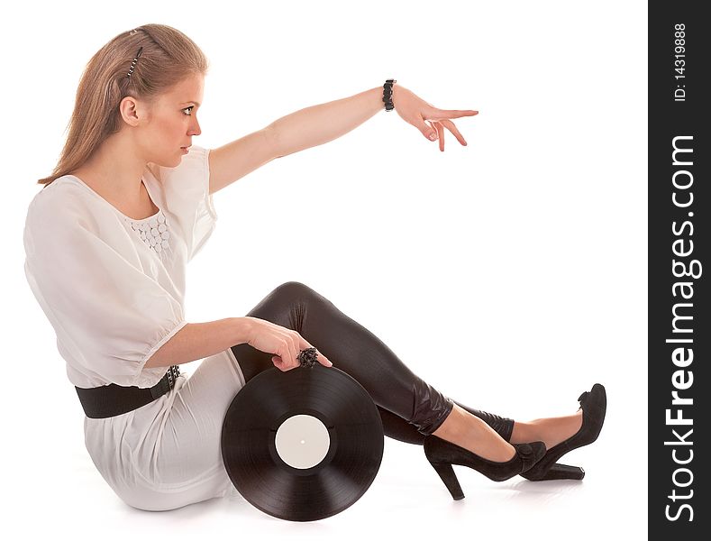 Young girl with a vinyl record on white. Young girl with a vinyl record on white