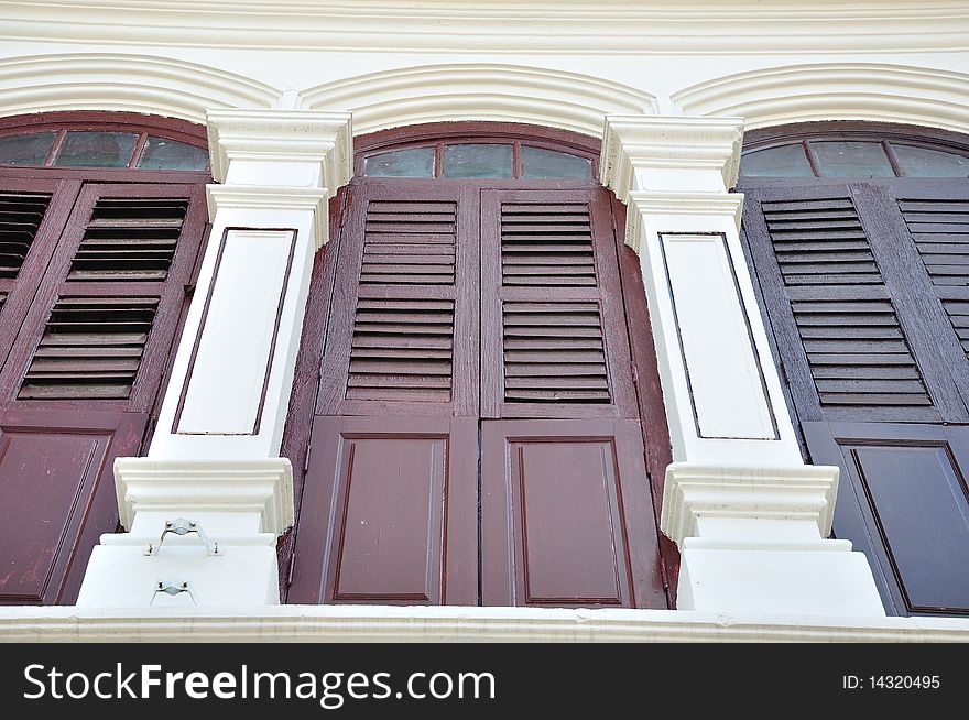 Windows to a traditional Sino-Portugese building in Phuket town, Thailand. Windows to a traditional Sino-Portugese building in Phuket town, Thailand