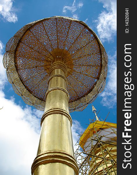 Golden pagoda with a bright sky. Chieng Mai Northern Thailand. Golden pagoda with a bright sky. Chieng Mai Northern Thailand.