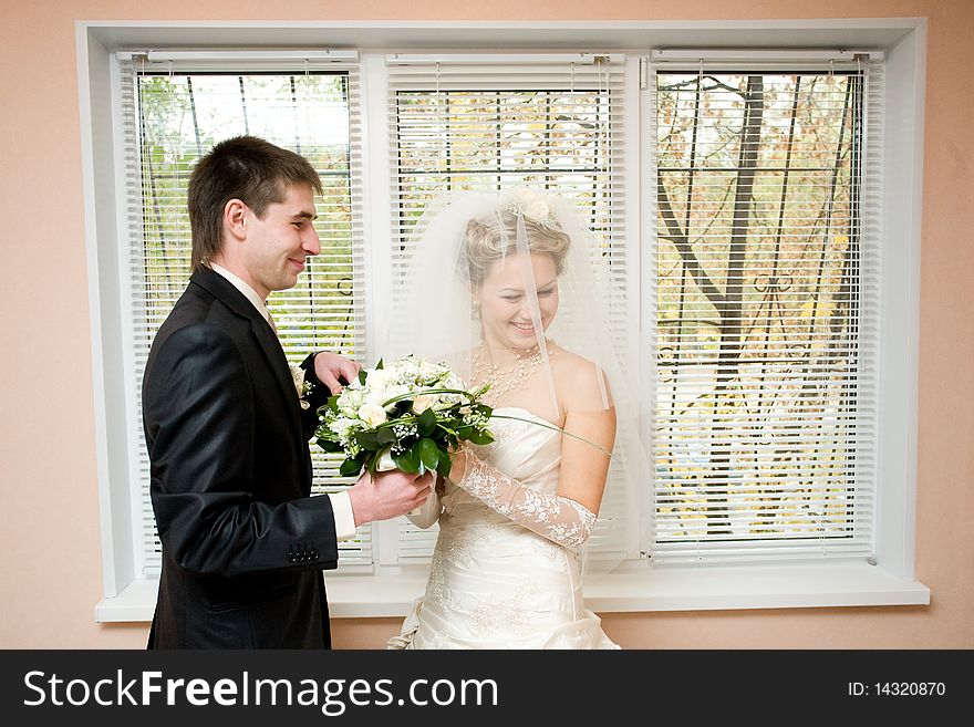 Bride and groom with flowers