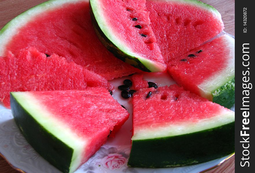 Slices of juicy watermelon on a plate. Slices of juicy watermelon on a plate
