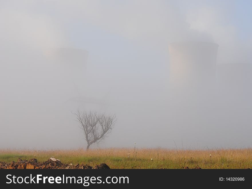 Power Station ghost-like in mist. Power Station ghost-like in mist