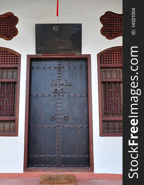 Door to a traditional Sino-Portugese building in Phuket town, Thailand. Door to a traditional Sino-Portugese building in Phuket town, Thailand