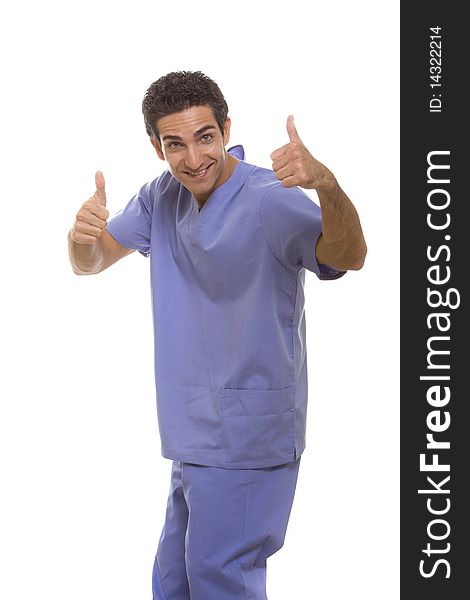Successful surgeon in scrubs uniform showing thumbs up. Successful surgeon in scrubs uniform showing thumbs up