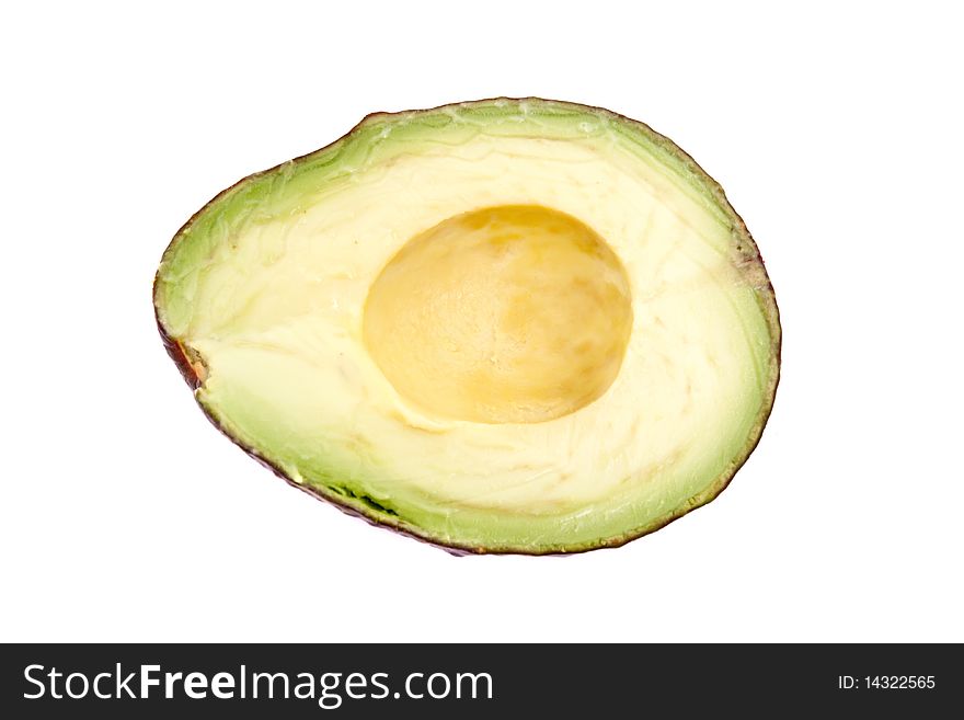 Half of an avocado on the white background