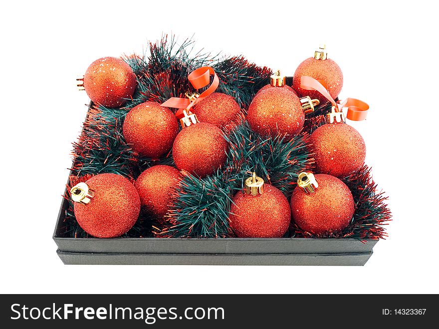 Set of red Christmas balls in a black box. Set of red Christmas balls in a black box