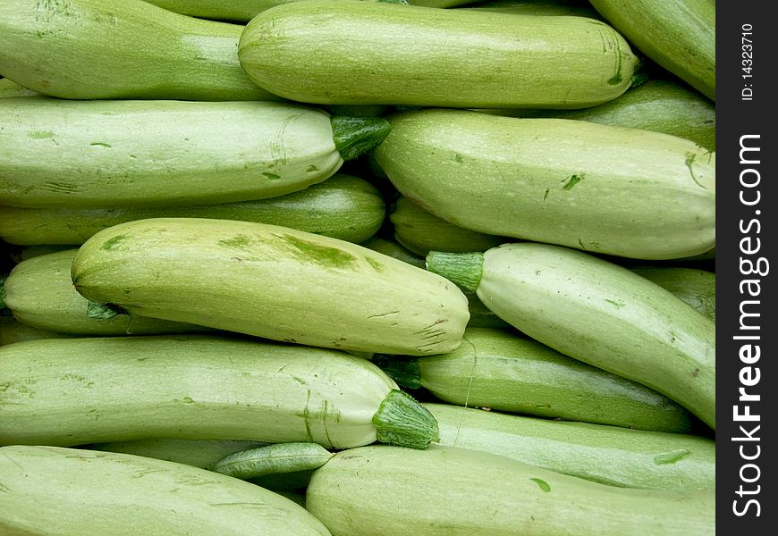 A lot of green pumpkins ready to be cook