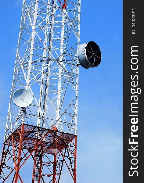 Telecommunication tower in the blue sky