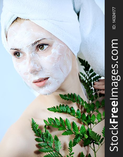 Portrait of a woman with beauty mask on her face. Spa, healthcare. Portrait of a woman with beauty mask on her face. Spa, healthcare.