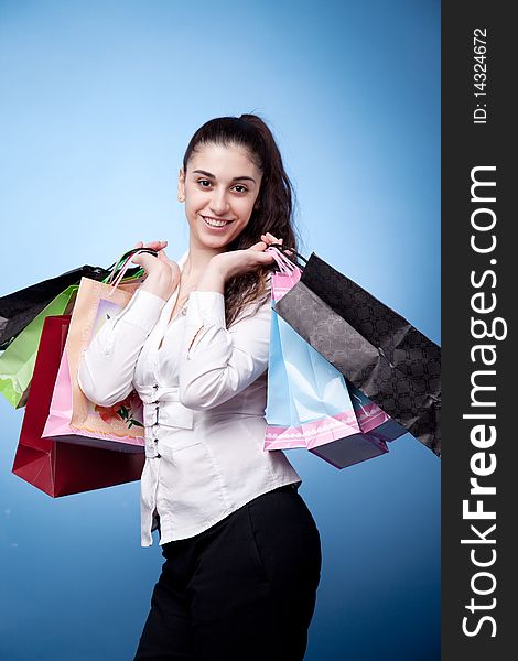 Attractive woman with shopping bags