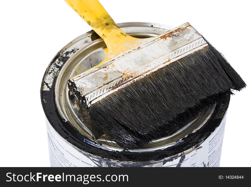 Dirty used brush over paint can, isolated. Dirty used brush over paint can, isolated