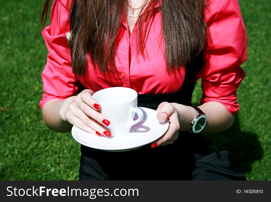 Young Businesswoman Holding White Cup