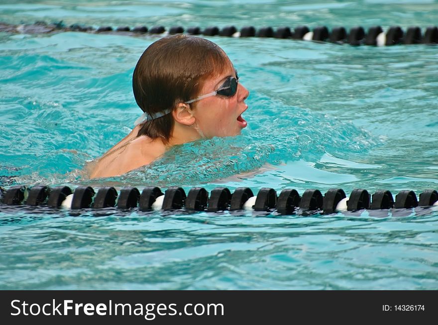 Young Boy /Breaststroke in Pool