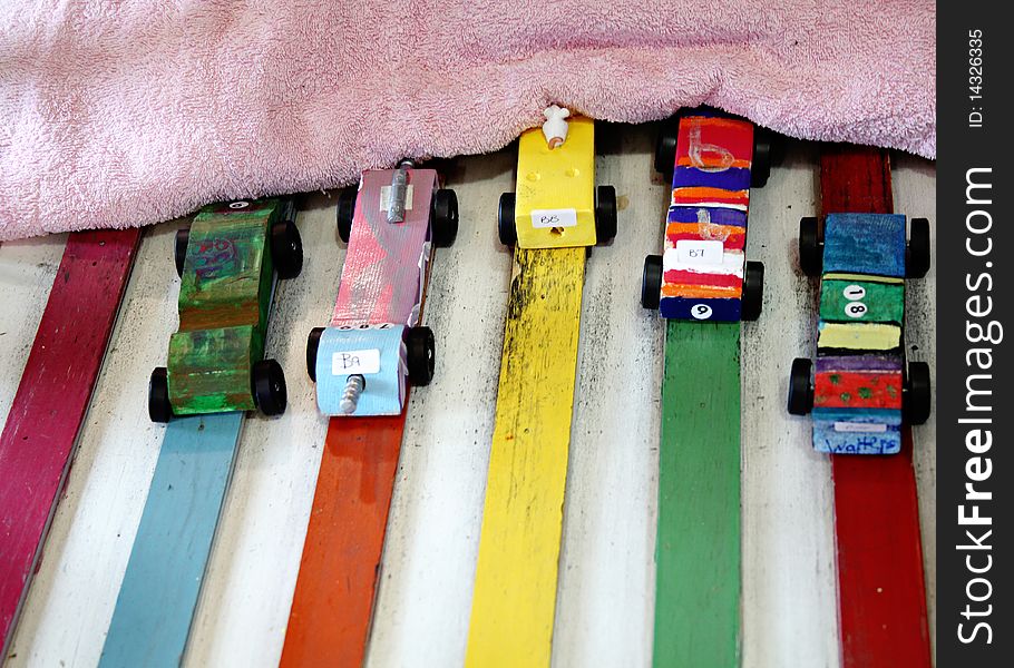 Wooden Derby cars at a race.