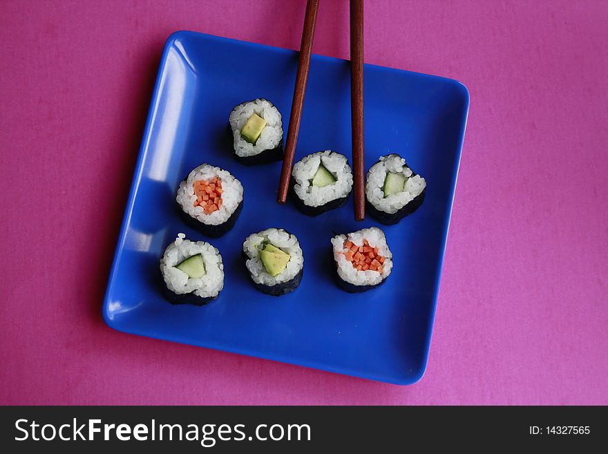 Vegetable Sushi On Blue Plate