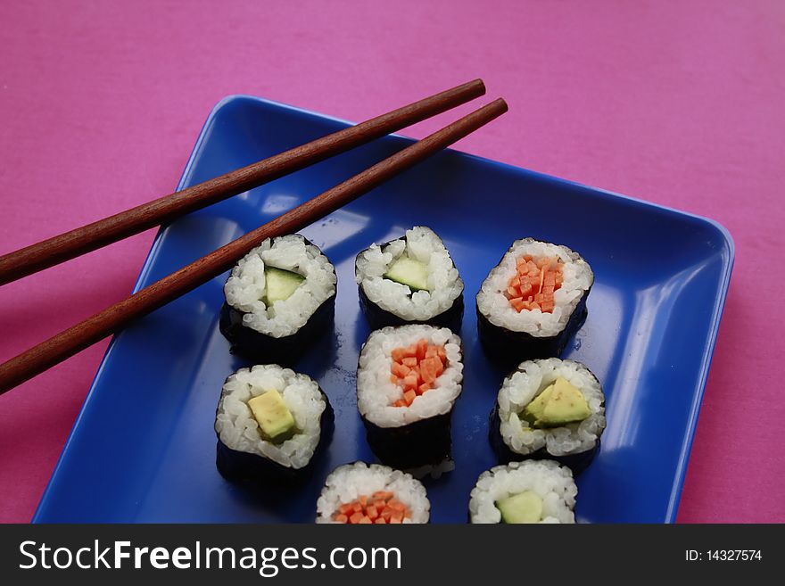 Vegetable Sushi On Blue Plate