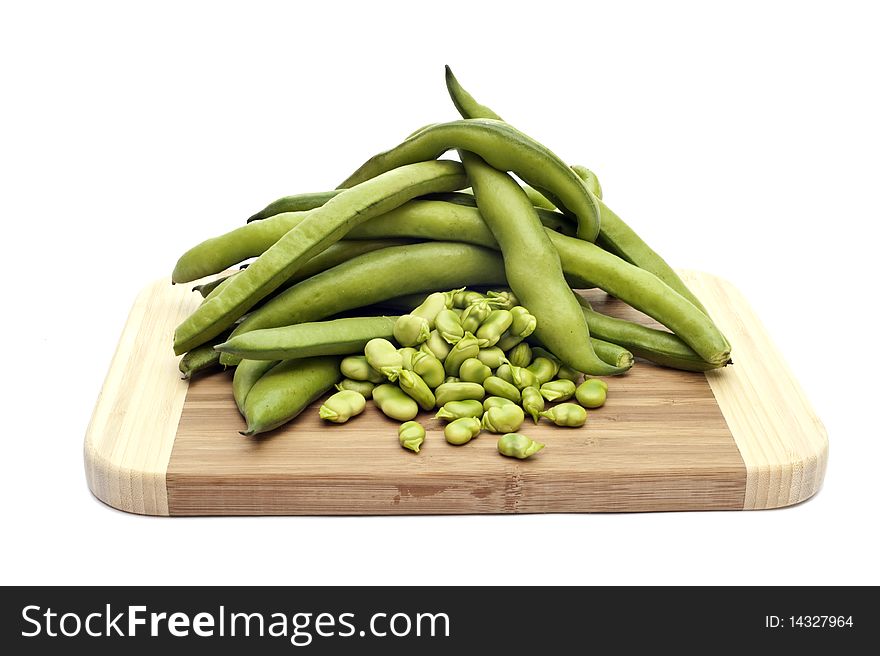 A platter with beans on white background. A platter with beans on white background