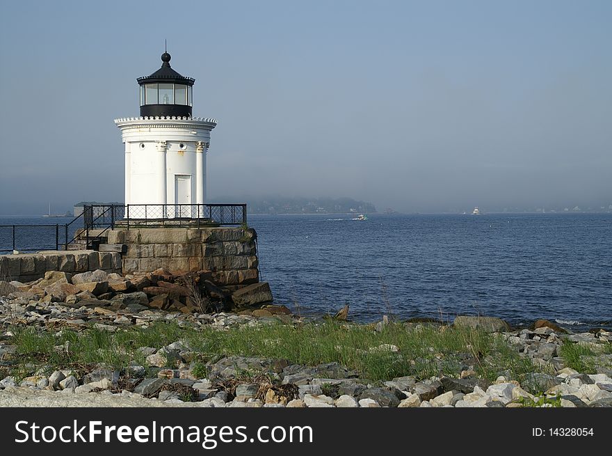 Portland Head Breakwater Lighthouse is located in the harbor of Portland, Maine.