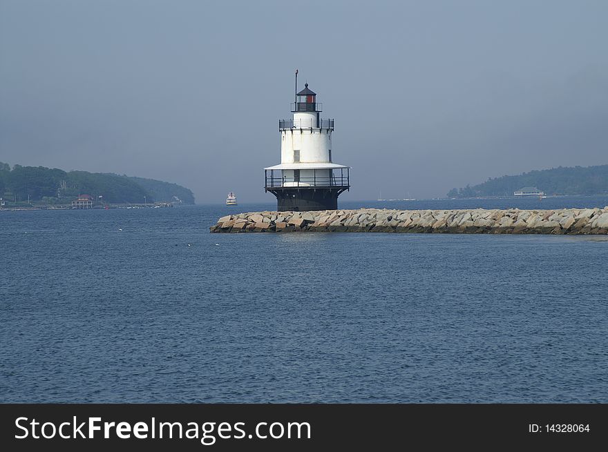 Spring Point Lighthouse is located in the harbor of Portland, Maine.