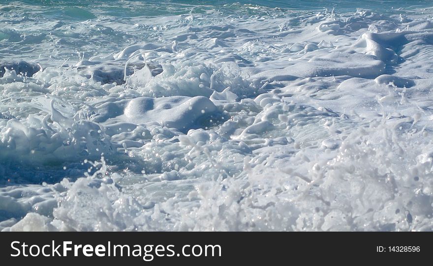 Sea foam splashing in a whirlpool in monterey. Sea foam splashing in a whirlpool in monterey.