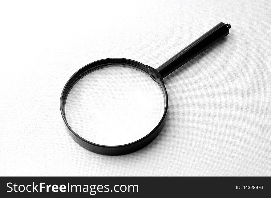 Magnifying Glass Over White Background