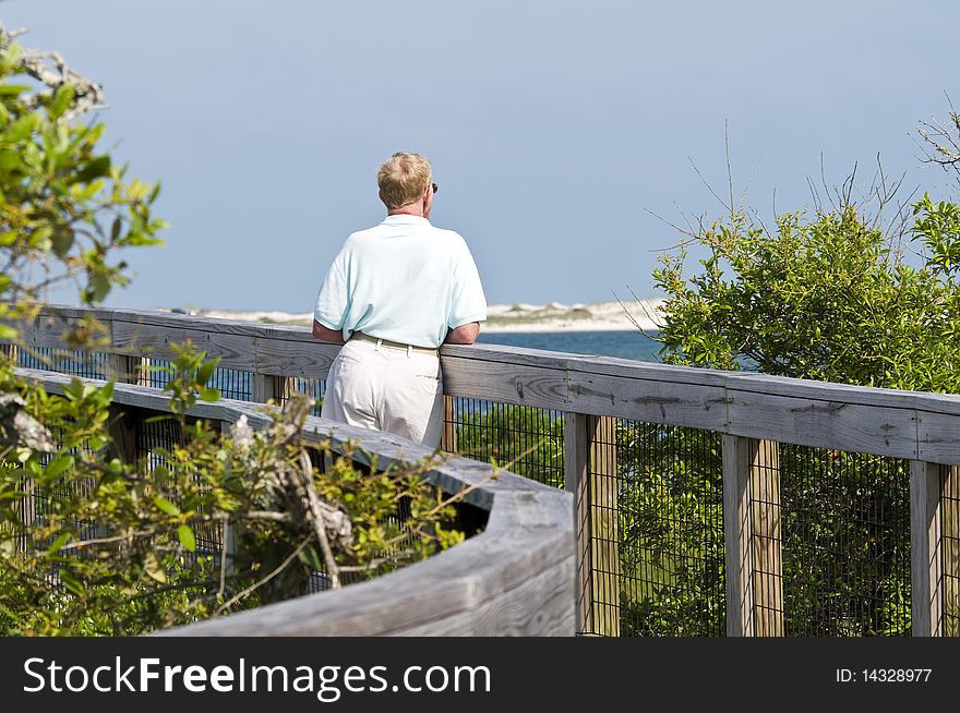 A senior man enjoying nature.