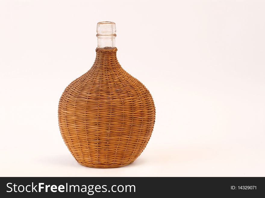 Bottle covered with the straw
