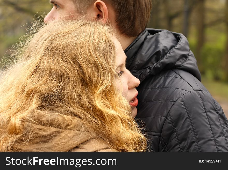 Girl's head on the shoulder of man