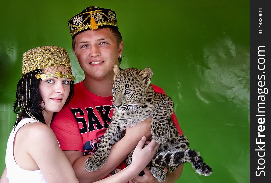 Portrait of people with a leopard