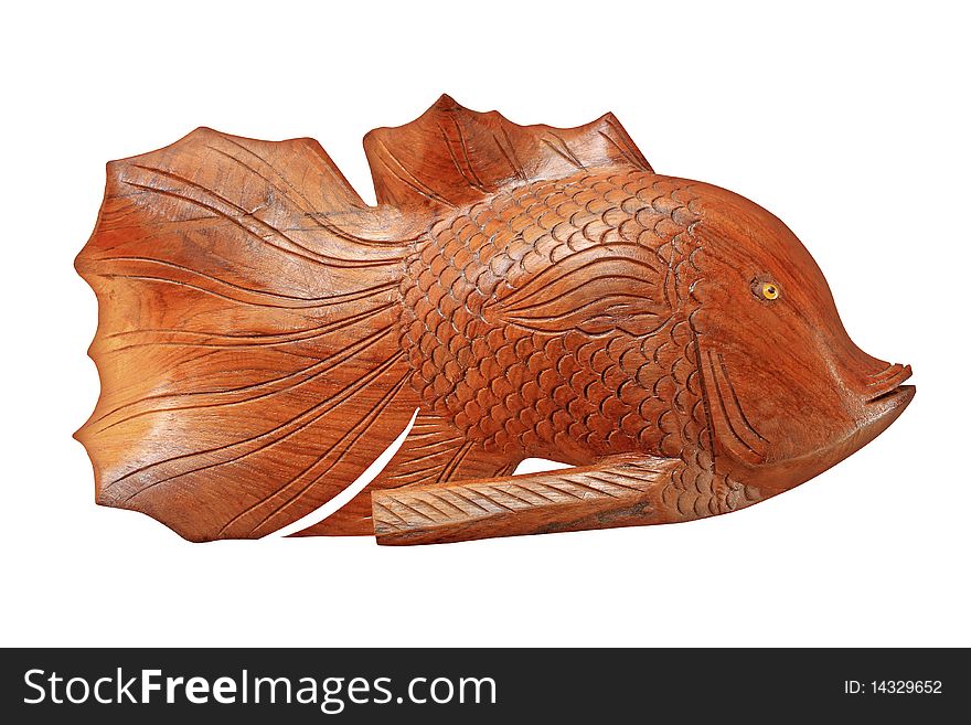 Wood carve fish handmade on wwhite background