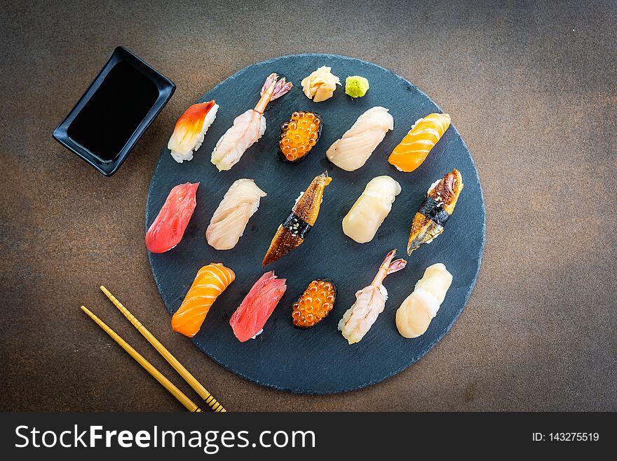 Nigiri sushi set with salmon tuna shrimp prawn eel shell and other sashimi