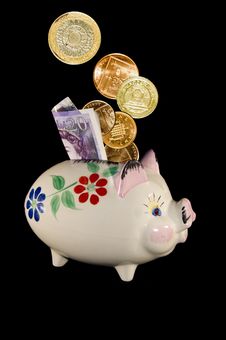 Piggy Bank With Money Stock Photography